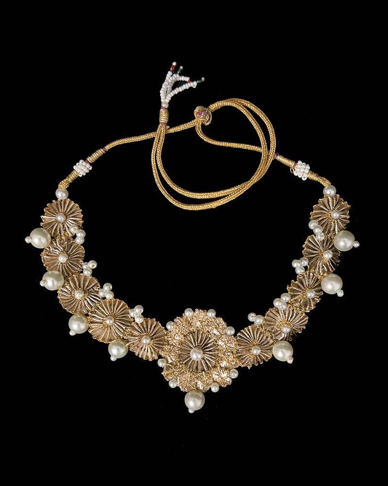 Handmade Tamba Gota necklace embellished with pearls. 